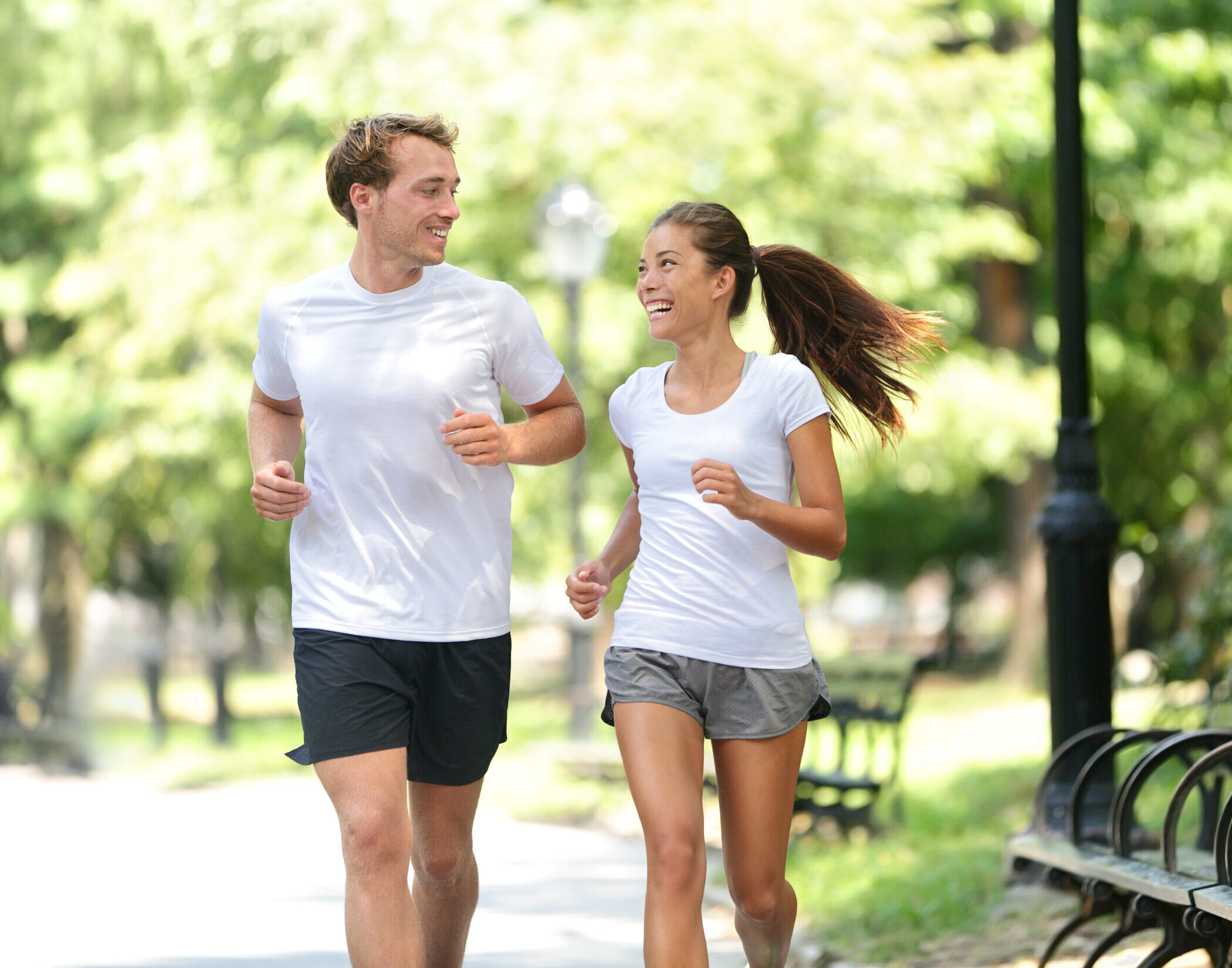 Runners jogging together in New York City Central Park, USA. Healthy couple of new yorkers athletes friends running in summer sun working out a cardio exercise on Manhattan, United Sates of America. SSUCv3H4sIAAAAAAAEAJ2QSw7CMAxE90jcocq6i34oElwFsTCpVSxCgxK3CKHenXxayWt2mWeP4/F3vysKdQNPWp2Lb1RBkzGTZwdMdgy4KleOPbF1BCbCyJZUUZ6BJ48+jliRBsYh9Ga4+rd/LlkXWyEVgyOUlCoF89MtsQ0t5d/O/LhuUWDAUX/SwiKIQ4OQg1xyq3q8Gd1TRpupRys0TD1ZkXK2Gkw0tGLyy5GmcRA2y3d08mLh5PYpwGg5bbIGU304aZR1W1dd01VNd+qObXM41CHl8gPxIkeEygEAAA==