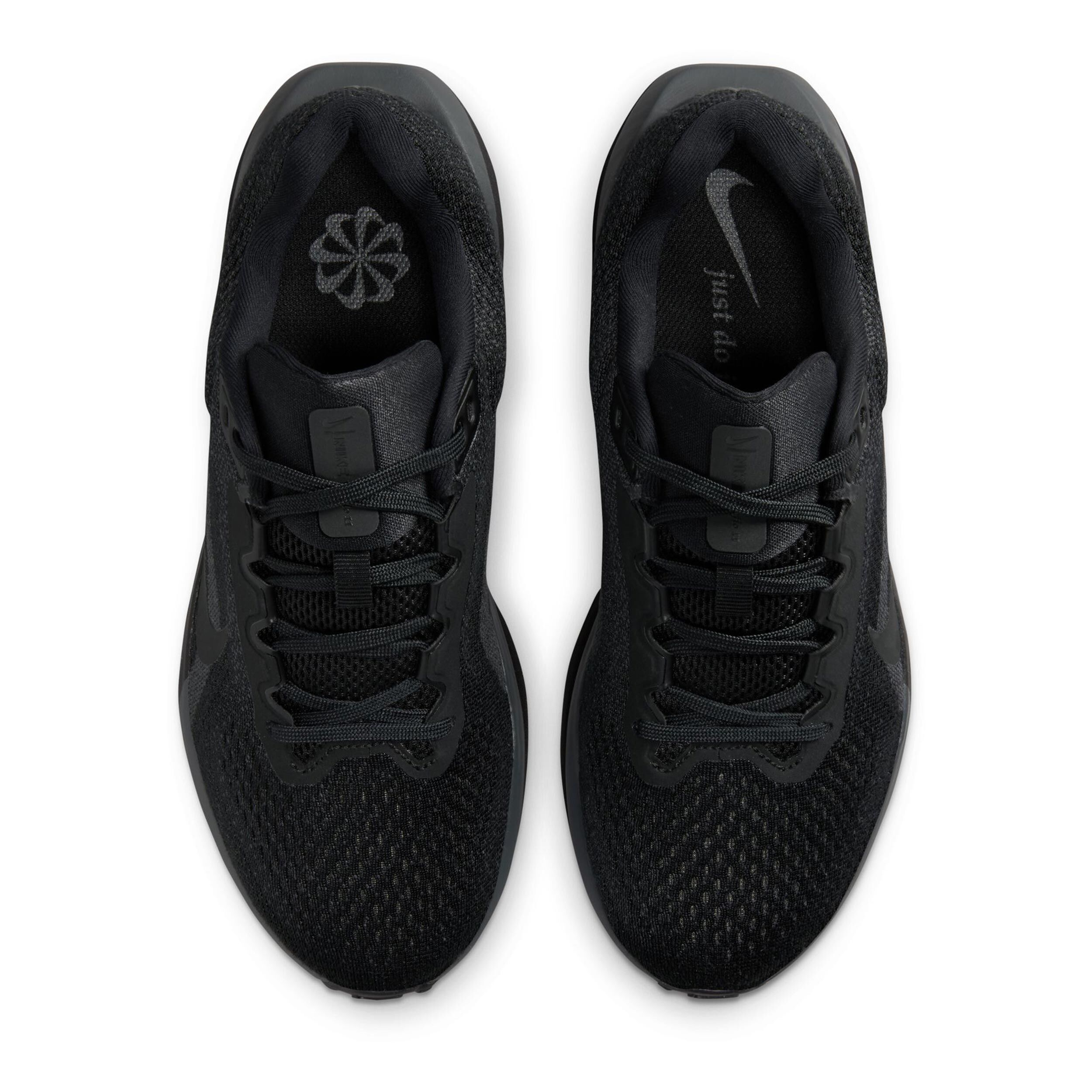 Solid black tennis shoes top